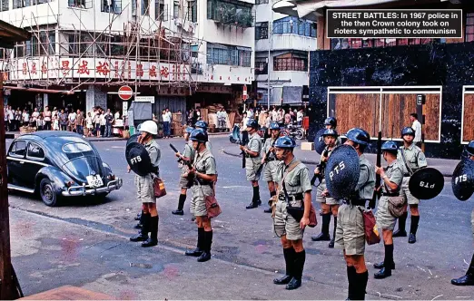  ?? ?? STREET BATTLES: In 1967 police in the then Crown colony took on rioters sympatheti­c to communism