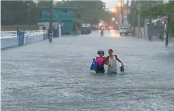  ?? EDDY VITTINI ?? Una calle inundada en el sector Los Prados en noviembre del 2023.