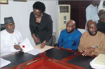  ??  ?? L-R: Lagos State Commission­er for Housing, Prince Gbolahan Lawal; Head, Legal Dept, Lagos State Ministry of Housing, Mrs. Adetoun Adeyemi; Chairman, Brains & Hammers Limited, Mr. Adebola Sheidu; and the Company Secretary, Mr. Abubakar Sheidu, during...