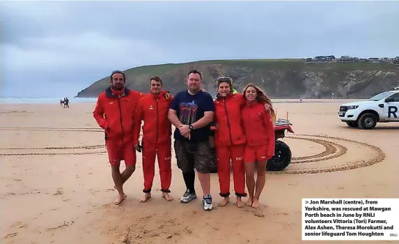  ?? ?? > Jon Marshall (centre), from Yorkshire, was rescued at Mawgan Porth beach in June by RNLI volunteers Vittoria (Tori) Farmer, Alex Ashen, Theresa Morokutti and senior lifeguard Tom Houghton RNLI
