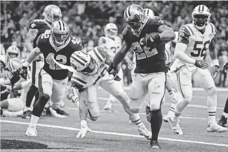  ?? DERICK E. HINGLE/USA TODAY SPORTS ?? Running back Mark Ingram scored 12 of the 23 rushing TDs for the Saints, who also had 23 passing TDs this season.