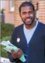  ?? DIGITAL FIRST MEDIA FILE PHOTO ?? Emanuel Wilkerson, then a senior in high school, greets voters in his bid for a spot on the Pottstown School Board.