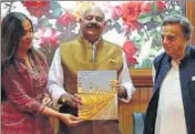  ??  ?? Punjab governor VP Singh Badnore releasing a book edited by Aabha Narain Lambah (left). Pakistani architect Nayyar Ali Dada (right) has authored a chapter on Lahore. HT PHOTO