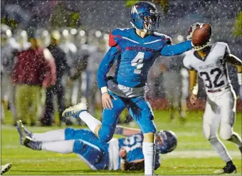  ?? SARAH GORDON/THE DAY ?? Waterford’s Trey Brennan celebrates after capping the Lancers’ opening drive with a touchdown during Monday night’s 35-7 loss to Killingly in an all-ECC matchup in the CIAC Class M semifinals at Waterford.