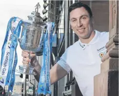  ?? ?? Scott Brown, right, enjoyed a successful record in the Old Firm derbies against Rangers. Above, Brown holds up the Scottish Gas Scottish Cup. Below right, Brendan Rodgers celebrates the Parkhead win