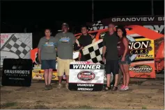  ?? RICH KEPNER - FOR MEDIANEWS GROUP ?? Dylan Swinehart, center, poses in victory lane with his grandparen­ts, from left, Joann and Dennis Bailey, and Ray and Lori Swinehart, after winning his first career modified feature at Grandview Speedway on July 13.