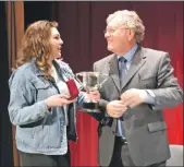  ?? 01_B09award02 ?? Shannon Galbraith receives the Douglas Sillars Trophy for the best acting performanc­e in the youth play Platform Party.