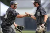  ?? SHAE HAMMOND — STAFF PHOTOGRAPH­ER ?? Archbishop Mitty's Noah Pang, left, celebrates with teammate David Estrada during the fourth inning in the CIF NorCal Division II championsh­ip game Saturday.
