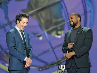  ?? Godofredo A. Vásquez / Staff photograph­er ?? Appearing with senior pastor Joel Osteen, Kanye West talked about overcoming adversity and his journey of faith during the Sunday morning service at Lakewood Church in Houston.