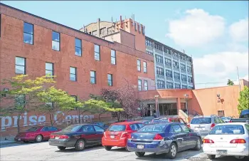  ??  ?? The Welford Sanders Historic Lofts, the proposed redevelopm­ent of a business incubator at 2821 N. 4th St., will be turned into 30,000 square feet of office space and 58 two- or three-bedroom apartments.