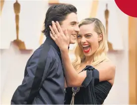  ??  ?? Little Women actor Timothee Chalamet and Margot Robbie, who was nominated for her role in Bombshell.