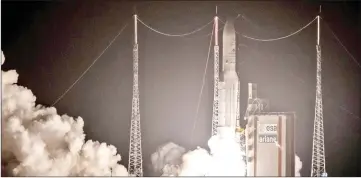  ?? — AFP photo ?? An Ariane 5 lifts off from its launchpad in Kourou, at the European Space Center in French Guiana.