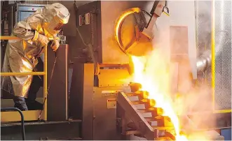  ?? AGNICO EAGLE MINES LIMITED ?? A worker pours gold at Agnico Eagle’s Meadowbank mine in Nunavut, where mining opportunit­ies face significan­t obstacles.