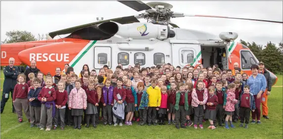  ??  ?? St. Kevin’s N.S. in Philipstow­n, Dunleer were very lucky to have a visit from the Irish Coast Guard in their Sikorsky Search and Rescue helicopter. The helicopter landed on St. Kevin’s playing fields and the children were given treated to an in depth...