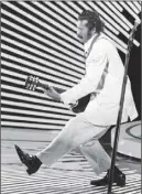  ?? AP PHOTO ?? Chuck Berry performing his signature “duck walk” during a show in 1980.