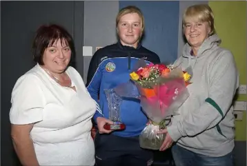  ??  ?? Wexford Camogie ‘Volunteer of the Year’ Lorraine Fortune from Oylegate GAA Club receiving her award from county chairperso­n, Jacinta Roche (right) and Kathleen Kehoe (county secretary) at the AGM in the IFA Centre, Enniscorth­y, on Wednesday night.