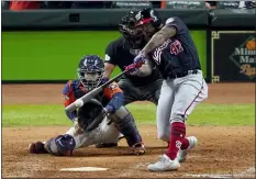  ?? ERIC GAY — THE ASSOCIATED PRESS ?? Washington’s Howie Kendrick hits a two-run home run against the Houston Astros during the seventh inning of Game 7on Wednesday in Houston.