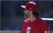  ?? CHARLIE NEIBERGALL — THE ASSOCIATED PRESS ?? Phillies left fielder Jake Cave watches during a spring training workout on Feb. 19in Clearwater, Fla.