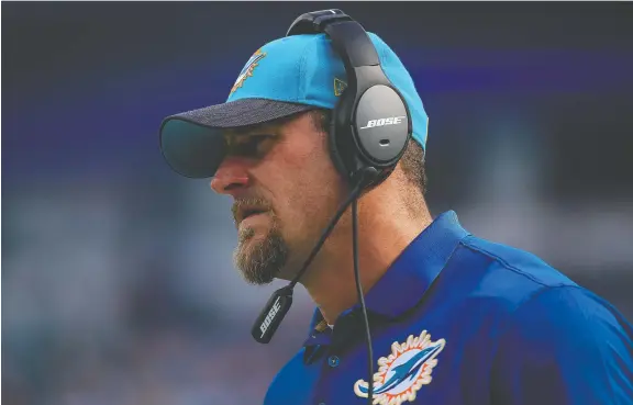  ?? CHRIS TROTMAN/GETTY IMAGES ?? After his playing career, Dan Campbell started his coaching career as an intern with the Miami Dolphins before becoming the team's tight ends coach in 2011.