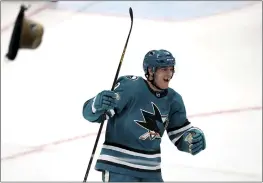  ?? SCOT TUCKER — THE ASSOCIATED PRESS ?? Sharks left wing William Eklund (72) celebrates a game-winning goal in overtime, giving him a hat trick and a 3-2victory over the Blues in Saturday's game in San Jose.