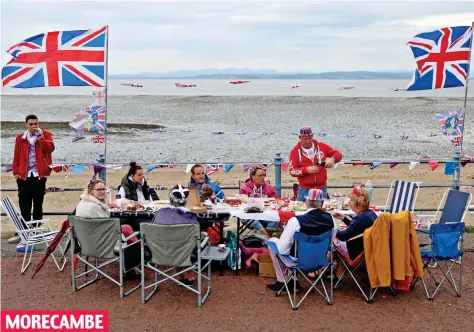  ?? ?? MORECAMBE
Record-breaker: At 1.6 miles, the Lancashire seaside resort took the record for longest Jubilee street party