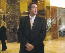  ?? Bryan R. Smith / AFP/Getty Images file photo ?? Attorney Michael Cohen arrives at Trump Tower for meetings with the-president-elect Donald Trump in New York in 2016. Federal agents raided the New York offices of Trump’s longtime personal lawyer Michael Cohen on Monday.