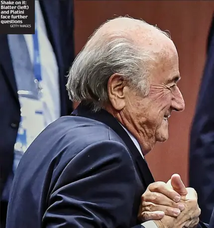  ?? GETTY IMAGES ?? Shake on it: Blatter (left) and Platini face further questions