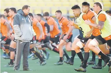  ??  ?? Steve Hansen (left) watches his team train ahead of their game against the British and Irish Lions in Wellington. — AFP photo