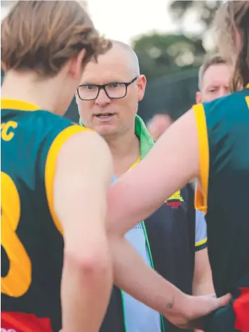  ??  ?? Werribee Centrals coach Nick Smith speaks with his players in last year’s GDFL finals series.