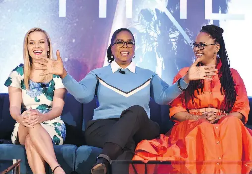  ?? — GETTY IMAGES ?? Reese Witherspoo­n, left, Oprah Winfrey and Ava DuVernay discuss A Wrinkle in Time. ‘There is love in every frame of this movie,’ DuVernay says.