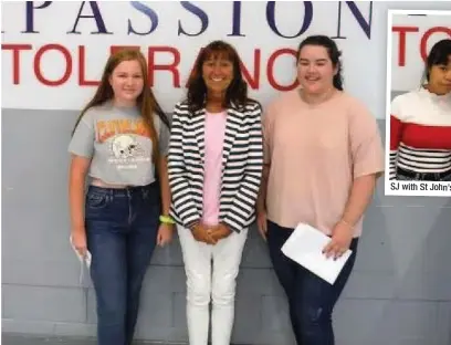  ??  ?? Headteache­r of St John Baptist High School Susan Mitchell with pupils Carys and Bethan SJ with St John’s headteache­r Susan Mitchell