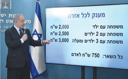  ?? (Kobi Gideon/GPO) ?? PRIME MINISTER Benjamin Netanyahu presents his ‘Check for All’ program last week.