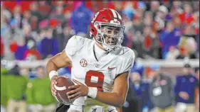  ?? Thomas Graning The Associated Press ?? Alabama quarterbac­k Bryce Young will be among the most coveted players — and perhaps the No. 1 pick — at the NFL draft in late April.