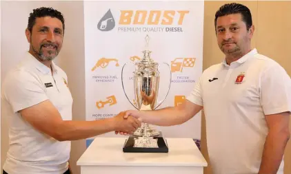  ??  ?? Paul Zammit, (L) coach of Birkirkara FC and Danilo Doncic, (R) coach of newly crowned Champions Valletta FC shake hands with one objective in mind - lifting the BOOST Diesel FA Trophy.