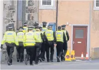  ??  ?? Police officers in action during 2012 bomb scare