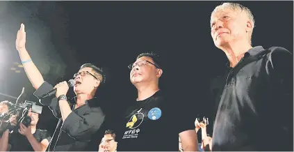  ??  ?? Founders of the Occupy Central civil disobedien­ce movement (from left), academic Chan Kin-man, academic Benny Tai and Reverend Chu Yiu-ming attend a campaign to kick off the movement in Hong Kong, China in this file picture. — Reuters photo