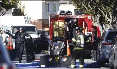  ?? SHAE HAMMOND — STAFF PHOTOGRAPH­ER ?? Police block off the road so the hazardous incident team can investigat­e in a neighborho­od across the street from Gunderson High School in San Jose on March 1.