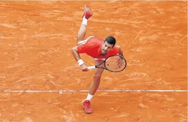  ?? [Reuters] ?? Novak Djoković möchte nach einem verpatzten Saisonstar­t ausgerechn­et auf Sand Fahrt aufnehmen.