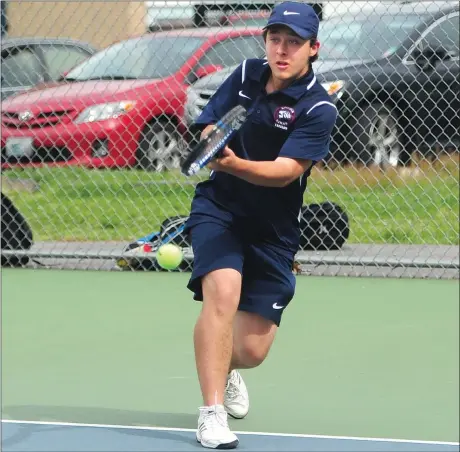  ?? Photos by Ernest A. Brown ?? Lincoln No. 1 singles player Michael Crawley (above) dropped the first set of his match with West Warwick’s Ethan Hoy during the No. 3 Lions’ 4-1 defeat to the Wizards in the Division II quarterfin­als Tuesday. No. 2 singles player Nick Phommachan­h...