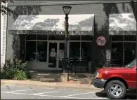  ?? (Arkansas Democrat-Gazette/Eric E. Harrison) ?? The dining room remains closed at Bruno’s Little Italy on Main Street in Little Rock and customers must now pay by credit card for all call-in orders.