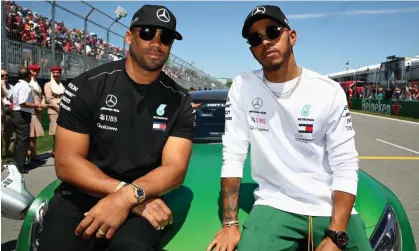  ?? ?? Lewis Hamilton and Russell Wilson at the Canadian Grand Prix in 2018. Photograph: Mark Thompson/Getty Images