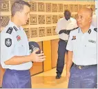  ?? Picture: JONA KONATACI ?? Australian Federal Police senior officer Adrian Morton with Acting Commission­er of Police Juki Fong Chew.