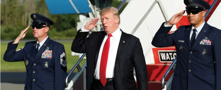  ?? (Yuri Gripas/Reuters) ?? US PRESIDENT Donald Trump salutes as he arrives Friday in Morristown, New Jersey, for a weekend at the Trump National Golf Club in Bedminster ahead of this week’s United Nations General Assembly.