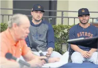  ??  ?? The Astros’ Jose Altuve, right, and Alex Bregman address the media on Thursday.