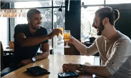  ?? ?? Chin chin: ‘You don’t have to get really drunk and screw something up spectacula­rly in order to discover who you are.’ Photograph: Westend61/Getty Images