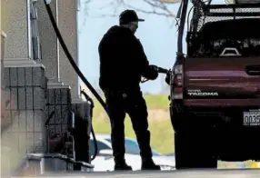  ?? — Bloomberg ?? Flat demand: a customer refuels at a petrol station in Hercules, California. Total consumptio­n of petroleum and renewable fuel oils has been flat over the last year.