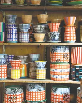  ?? Gabrielle Lurie / The Chronicle ?? At her Pala Ceramics studio, Sonami’s distinctiv­e plaid patterns and bold contrasts in her bowls, mugs and tumblers are easy to spot.