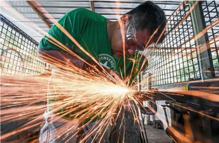  ?? — Photos: Bernama ?? ‘To learn this craft is to have passion and patience for it. Only then will your work be neat and perfect,’ says Wan Islahuddin.