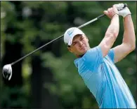  ?? AP/ TONY GUTIERREZ ?? Germany’s Martin Kaymer tees off on No. 3 Thursday during the fi rst round of the PGA Championsh­ip. Kaymer fi nished with a 4- under 66 that left him in a three- way tie for second heading into today’s second round.