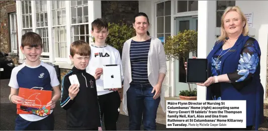  ?? Photo by Michelle Cooper Galvin ?? Máire Flynn Director of Nursing St Columbanas’ Home (right) accepting some ‘Kerry Covert 19 tablets’ from the Thompson family Neil, Karl, Alex and Una from Rathmore at St Columbanas’ Home Killarney on Tuesday.